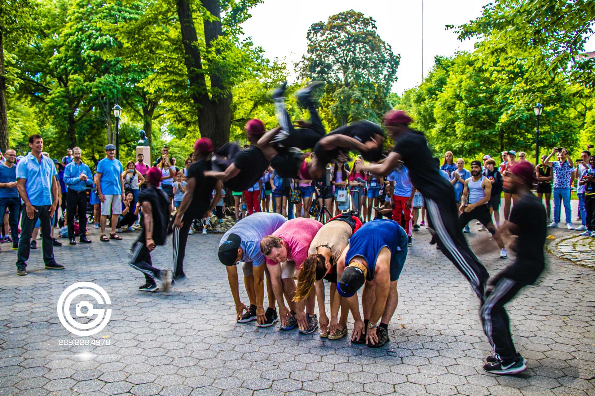 Central Park street performer jumps over crowd