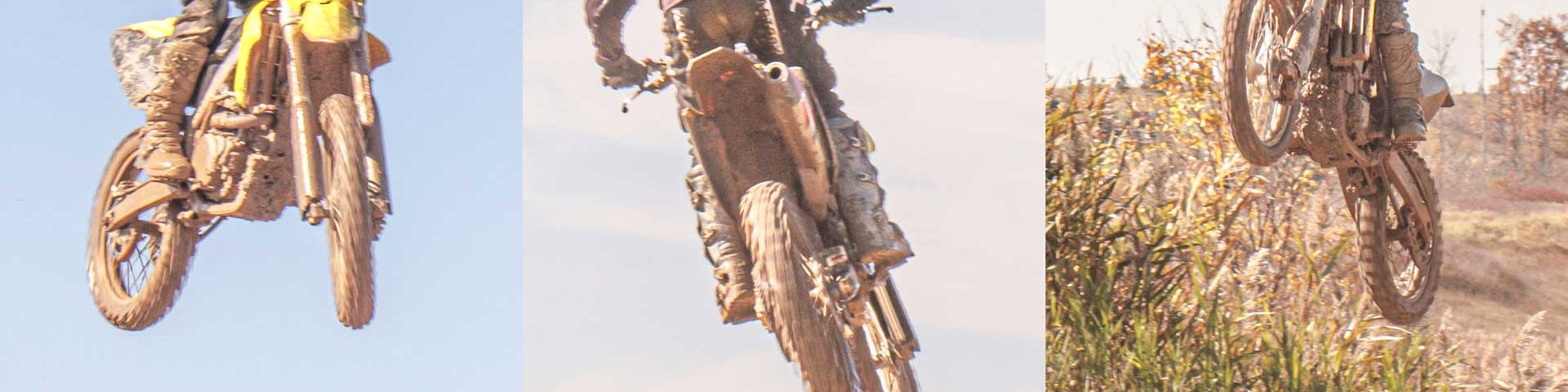 three motorcross bikes in the air