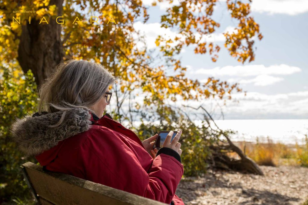 Nikki relaxes on a bench at Morgan's Point