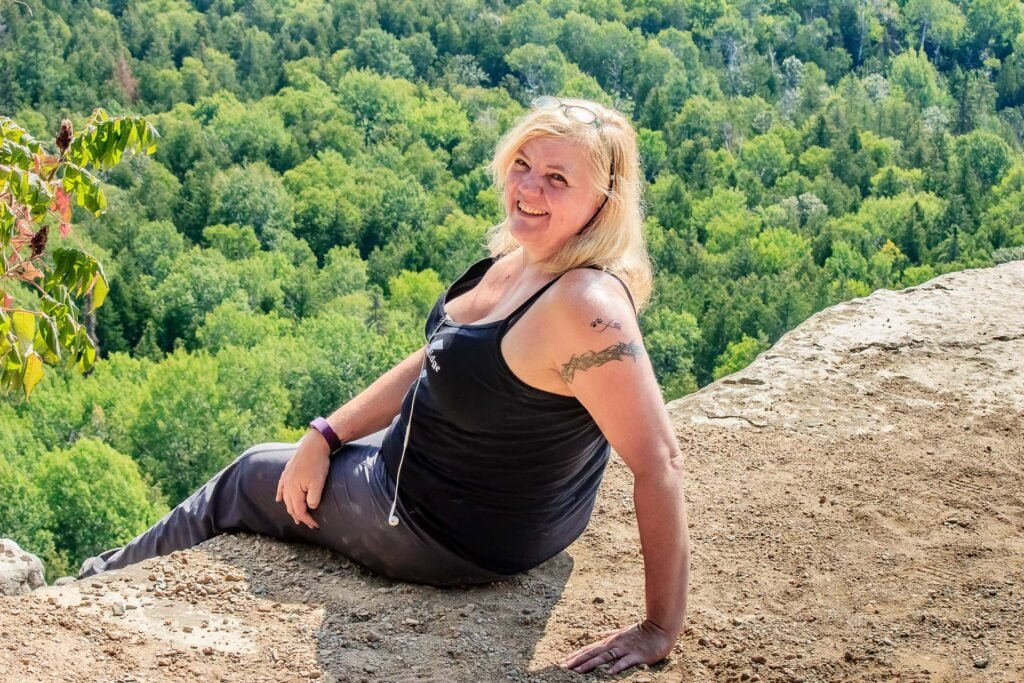 Sitting on the edge at the Manitoulin Cup And Saucer Trail.