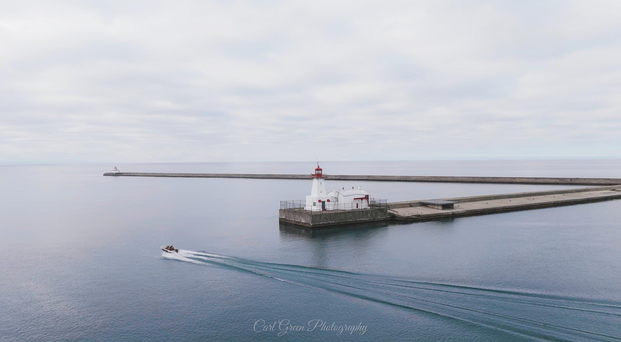 A boat motors out of the Port Colborne harbour